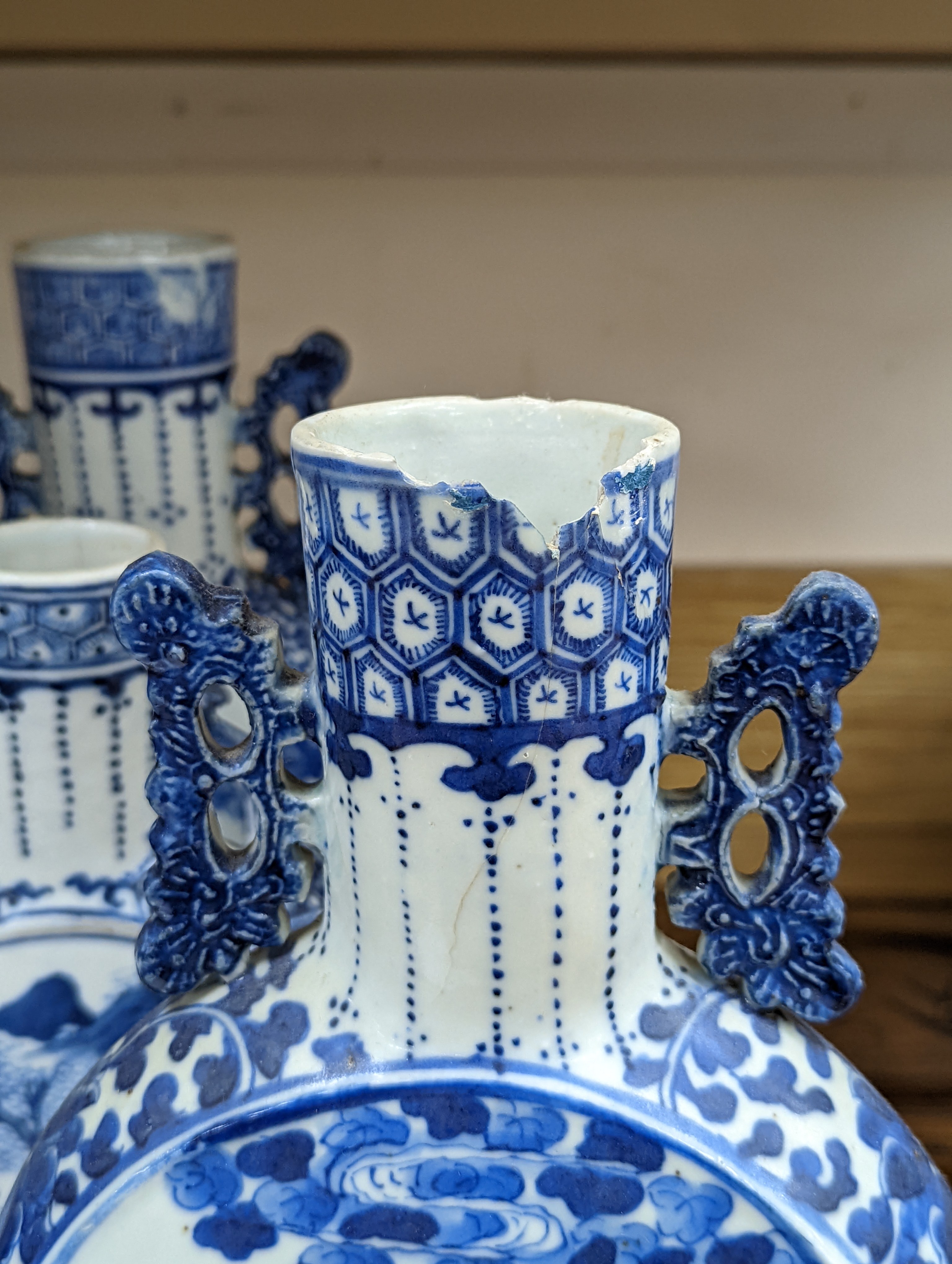 Three 19th century Chinese blue and white Moon flasks, tallest 31 cms.